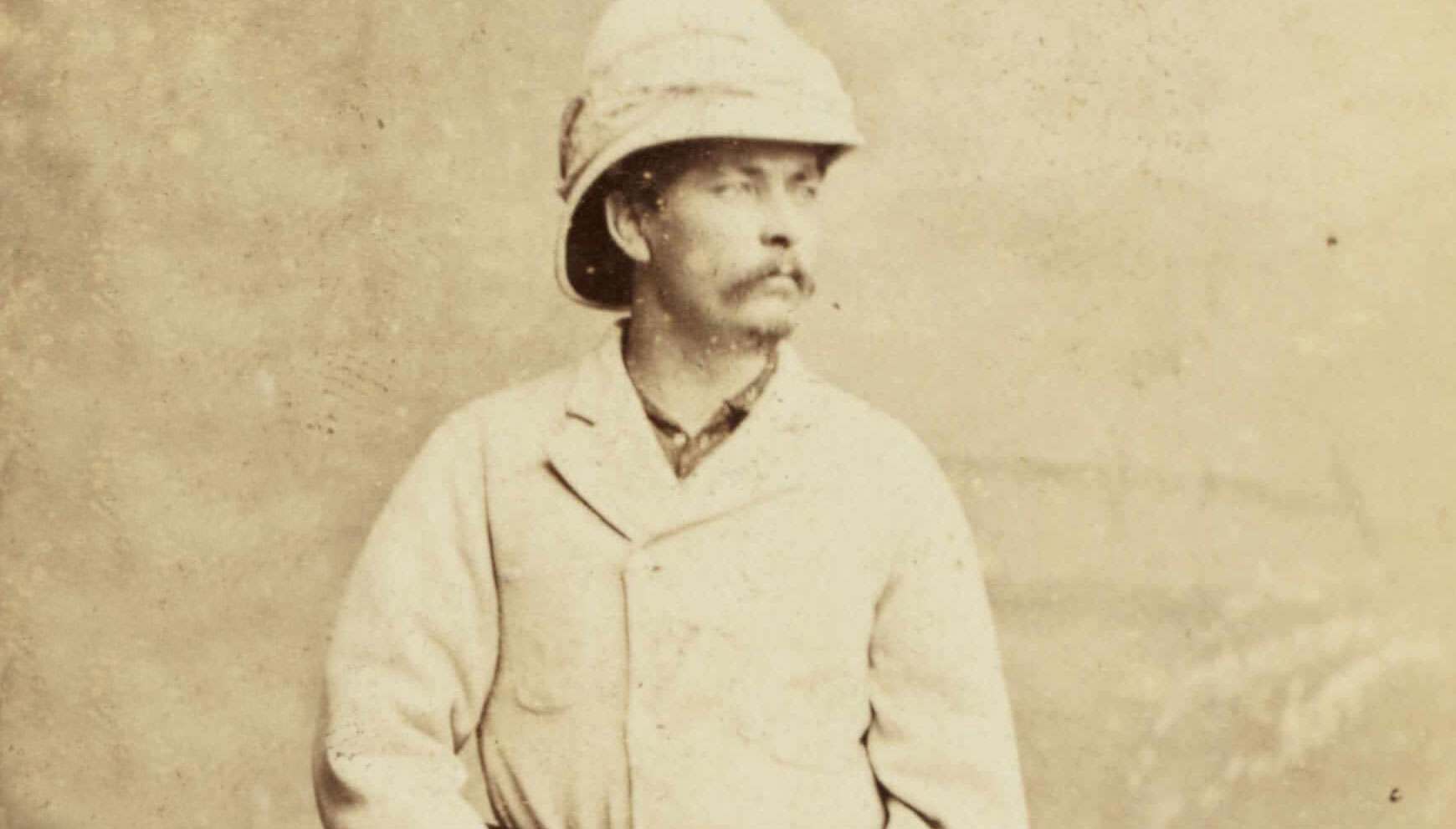 Henry Morton Stanley wearing a explorer hat and a Cordings linen shirt in a warm country