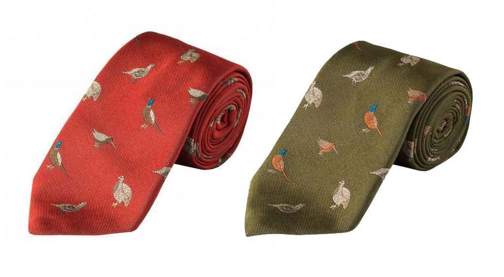 Two shooting ties decorated with British game birds. The right in an orange rust colour and the left in olive green